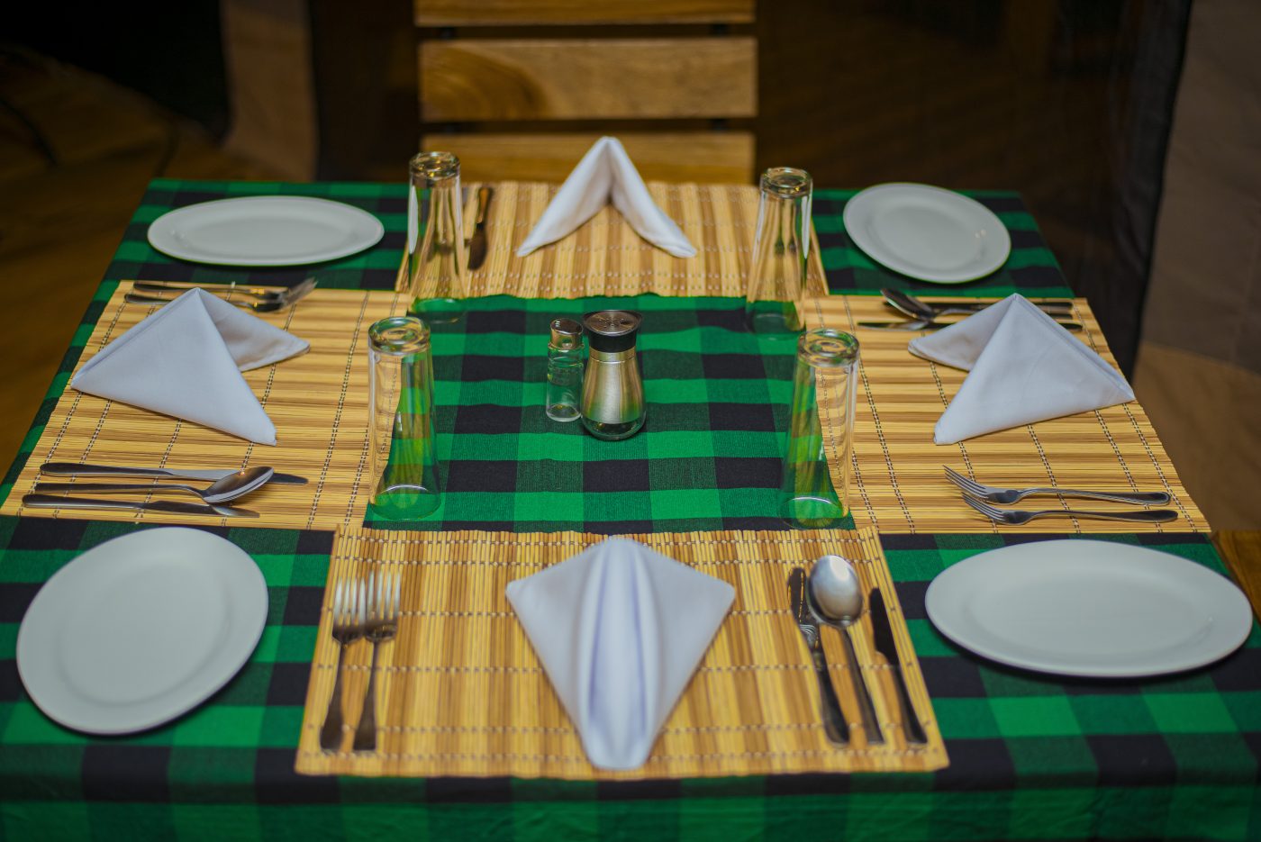 Dining table with plaid linens